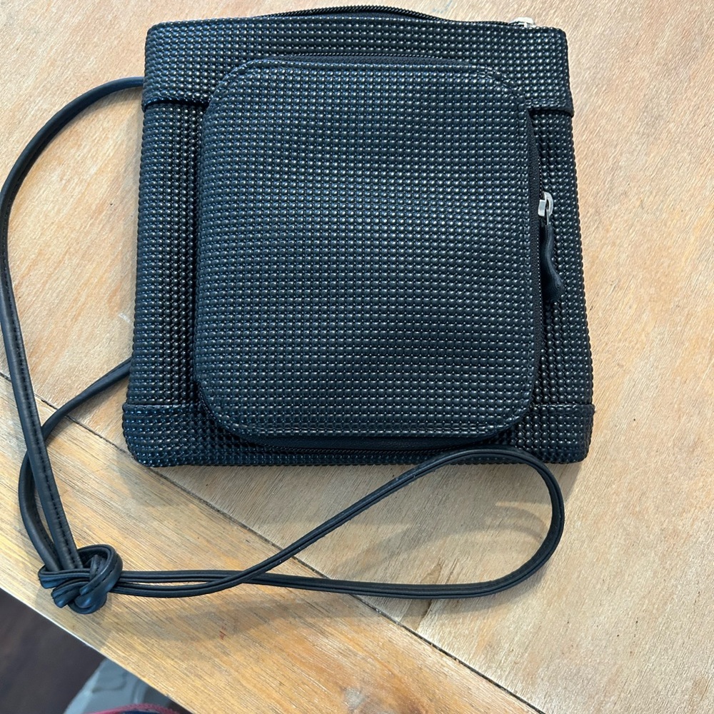 Urban oxide Black rubber Textured  Crossbody Bag. Made of recycled material.